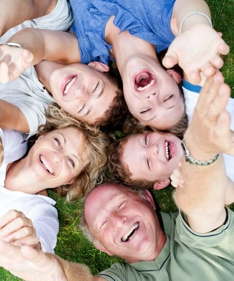 Multi-generation family lying in circle